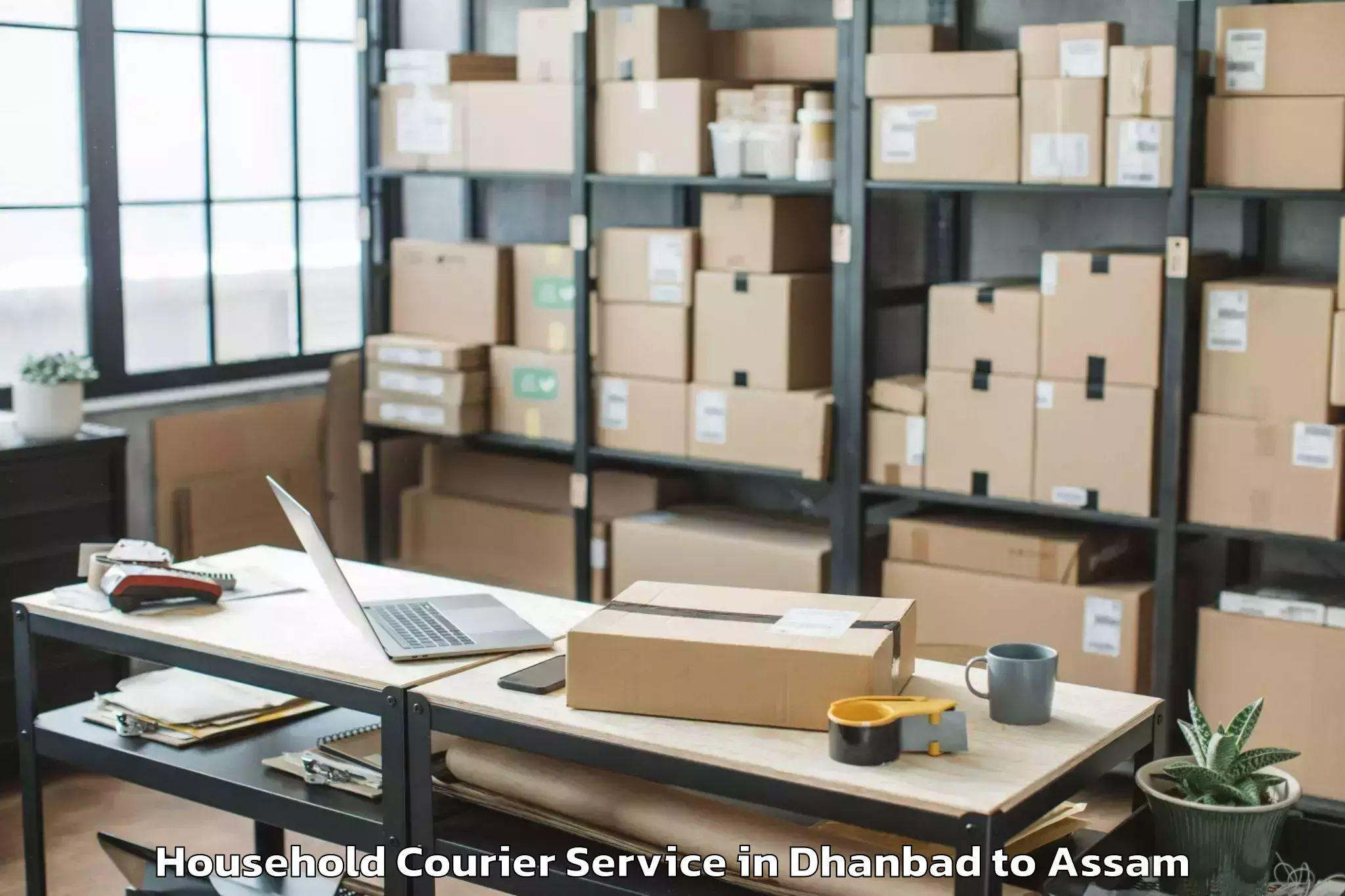 Leading Dhanbad to Sarupeta Pt Household Courier Provider